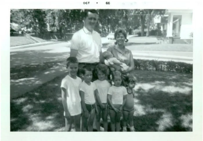 Beth Ford (front, far right) as a child with her parents and siblings in the 1960s. Ford family