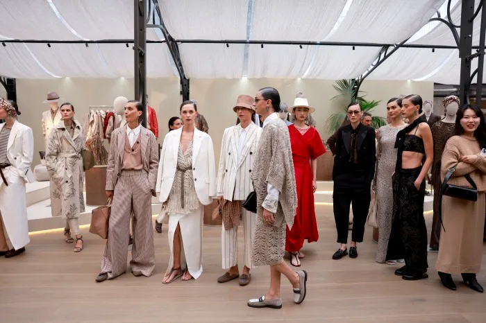 Models dressed in the subdued tones of Brunello Cucinelli’s women’s collection during Milan Fashion Week. Claudio Lavenia/Getty Images for Brunello Cucinelli
